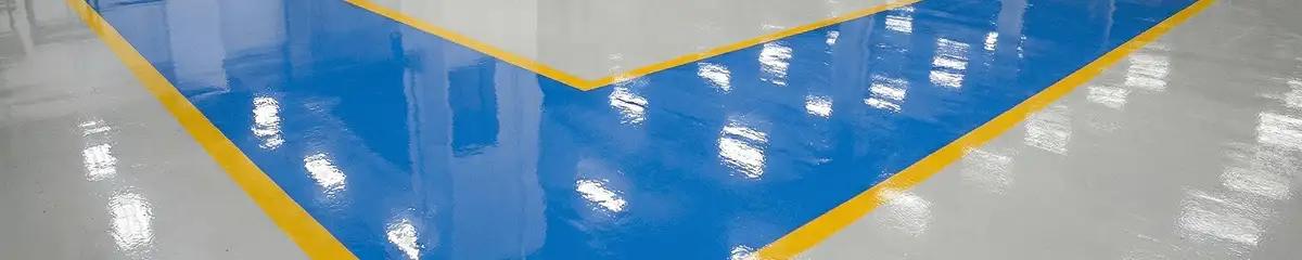 A factory floor professionally covered and marked with epoxy flooring in Stamford, CT