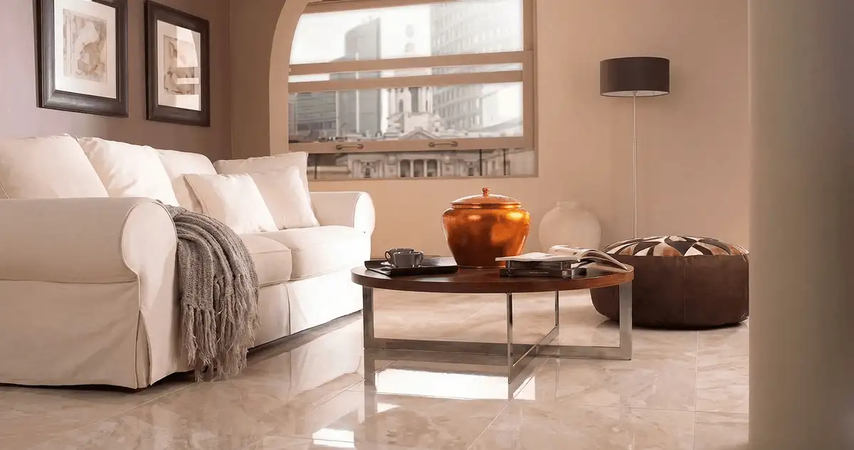 Modern living room with professionally installed marble flooring, a beige sofa, coffee table in Stamford, CT