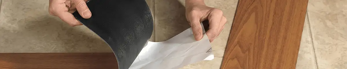 A professional installing vinyl flooring in Stamford, CT